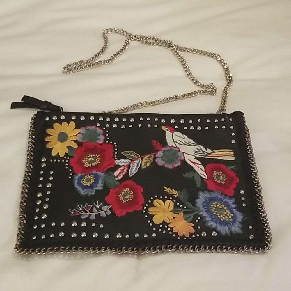 Black embroidered and studded clutch bag